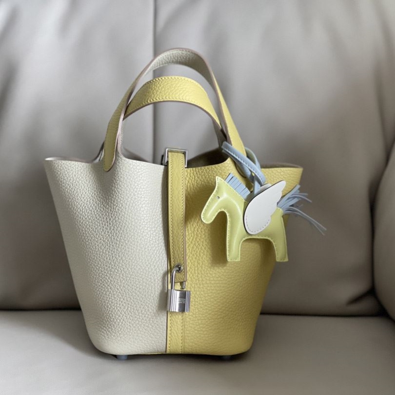 H**mes shopping bags